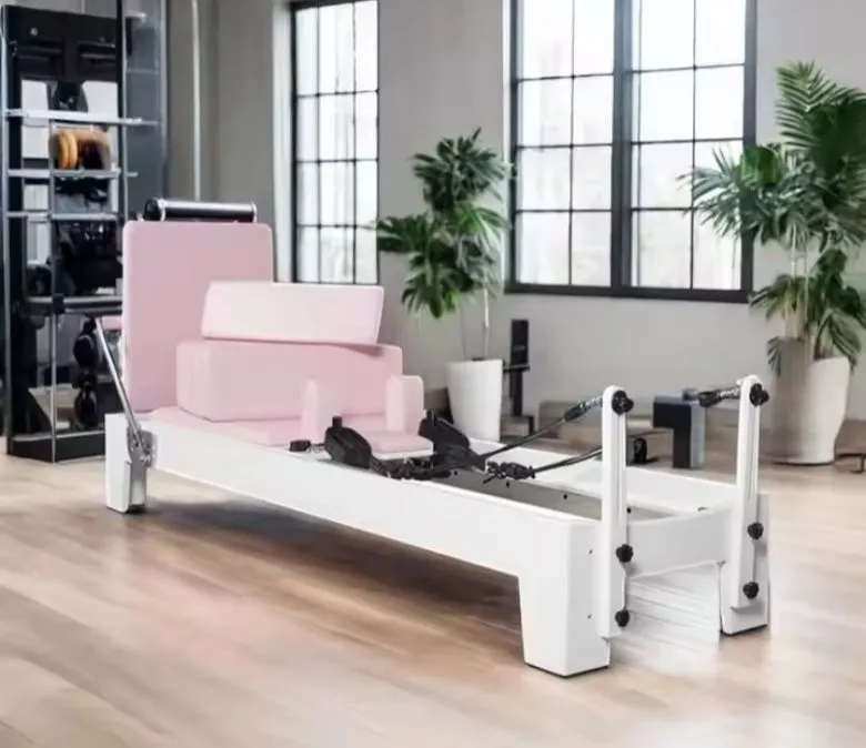 Бяло боядисано дъбово розово оборудване за пилатес