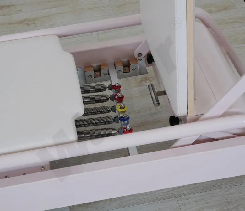 Нов розов стоманен пилатес реформатор с вградена лента за крака